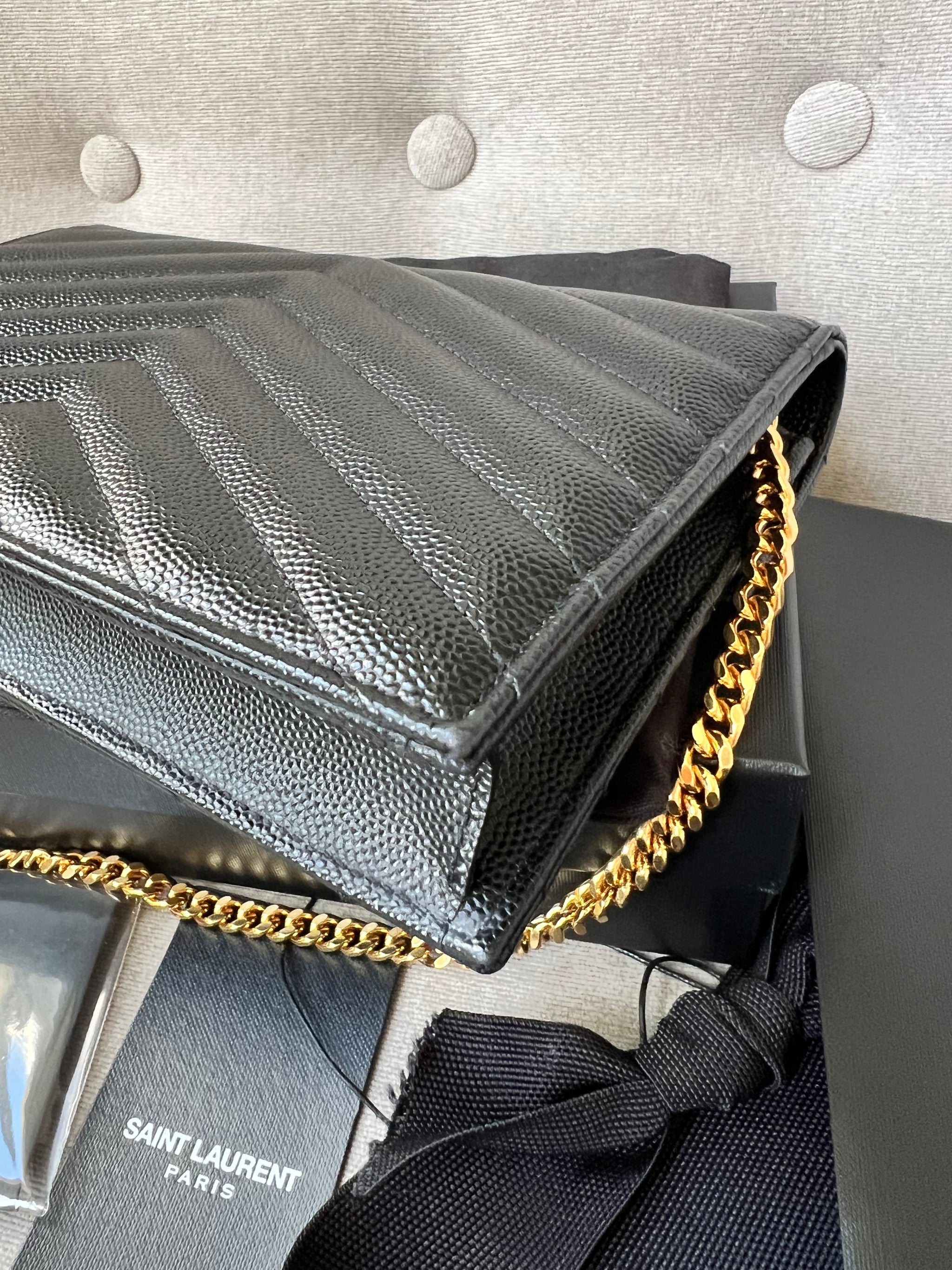 saint laurent envelope wallet on chain
