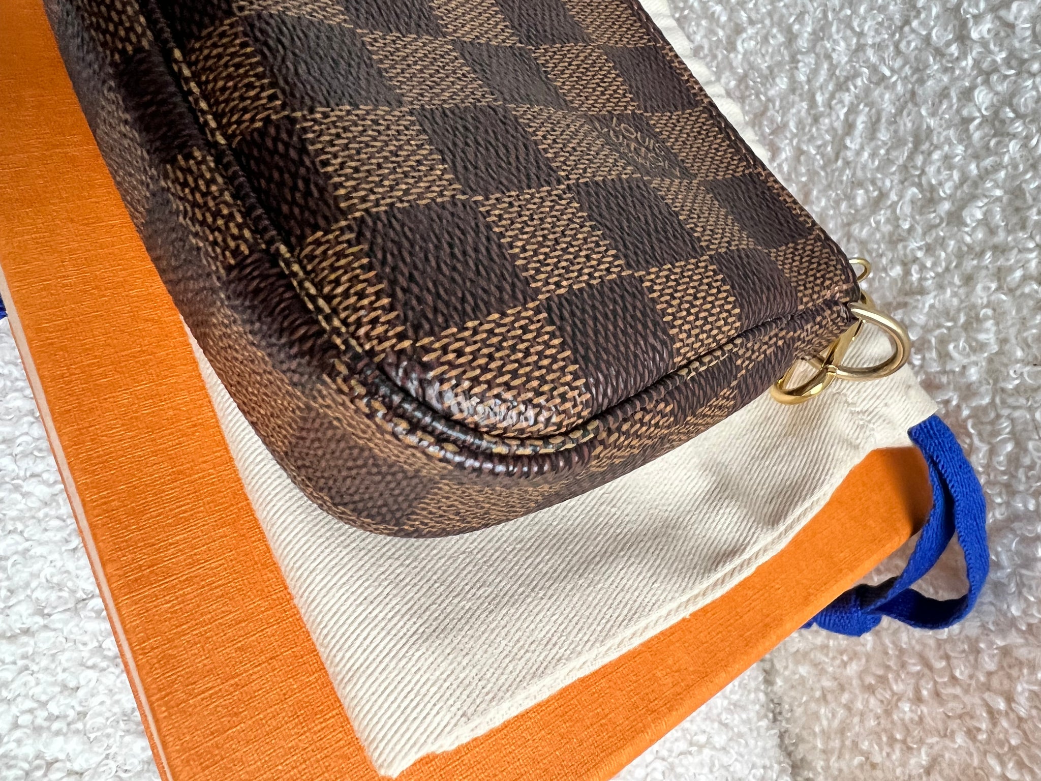 Louis Vuitton mini pochette damier ebene Mini Bags