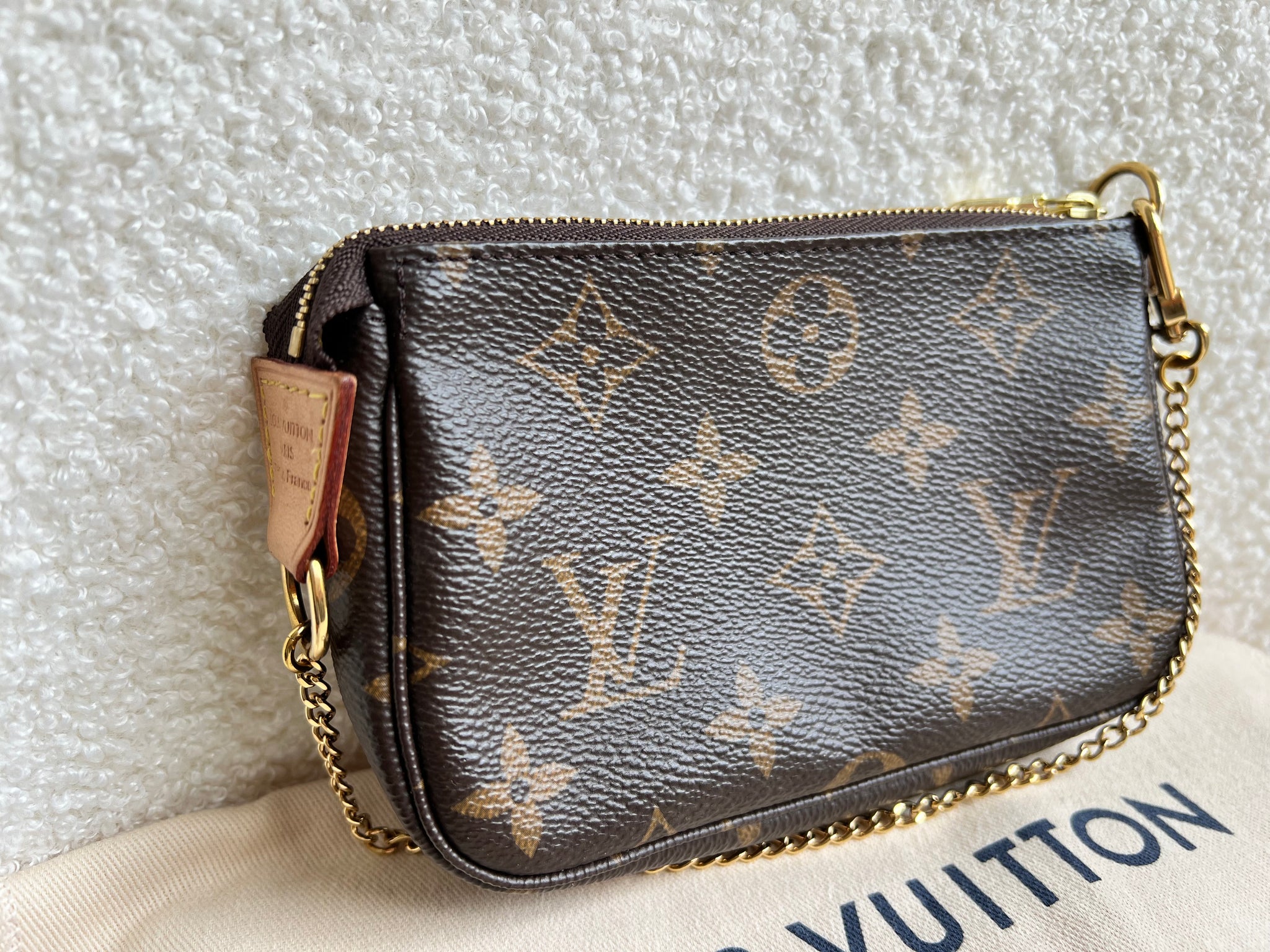 Mini pochette monogram hotsell