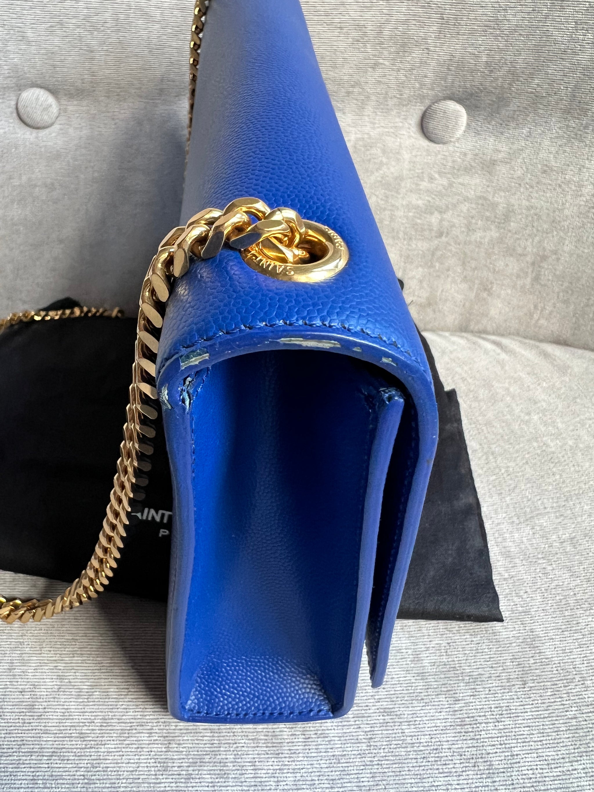 Yves saint laurent blue bag hotsell